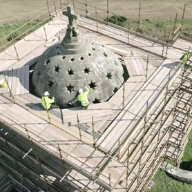 Skilled masons work on the roof.
&copy; Borders Aerial Photography